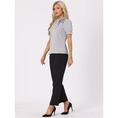 This regular-fit blouse will complement many body types to keep you looking great all day. The soft woven poly shapes a gathered neck, straight-cut silhouette, framed by puffy short sleeves with elastic cuff. Your wardrobe is not complete without this elegant office shirt. Pair it with high-waist pants and heels for an easy chic style. A sweet bow tie detail lends an elegant air to an everyday top. Stretch Puff Sleeve Blouse For Work, Chic Stretch Puff Sleeve Top For Work, Solid Stretch Blouse For Formal Wear, Elegant Stretch Puff Sleeve Top With Short Sleeves, Formal Stretch Blouse, Stretch Blouse For Formal Occasions, Solid Padded Blouse For Work, Solid Color Padded Blouse For Work, Elegant Puff Sleeve Tops For Business Casual