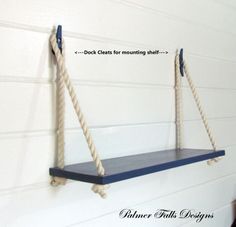 a blue shelf with rope hanging from it's sides and the words dock clear for mounting