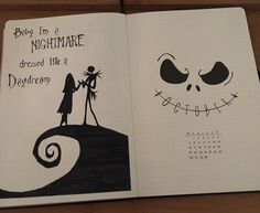 an open notebook with a drawing of jack and sally from the nightmare before it's dark