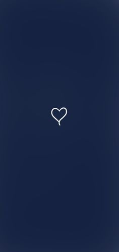 a white heart on a dark blue background