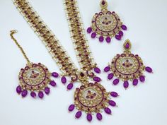 This Beautiful Antique Gold Polki Stone Long Mala Necklace  Rani Haar Set for all Vibrant colors for your special events. Set Includes: Necklace, Tikka and Earrings Jewellery Care -- Keep all the jewellery away from water, perfumes, and other harsh chemicals To clean wipe with a lint-free cloth to retain the shine Dimension:- necklace:- Length 15" Earrings:- Drop Length 4" Approximately. Please Note- No Returns No Exchange Rani Haar, Jewellery Indian, Polki Jewellery, Nose Jewelry, Beautiful Handbags, Mala Necklace, Indian Jewellery, Pearl Pendant, Indian Jewelry