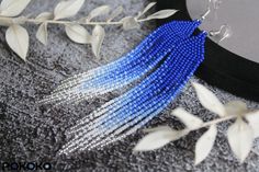 Blue white silver seed bead earrings Evening silver shining | Etsy Silver Beaded Chain Earrings, Bohemian Blue Beaded Earrings With Silver Beads, Blue Beaded Chain Earrings For Party, Elegant Blue Beaded Fringe Earrings, Elegant Blue Beaded Earrings With Tiny Beads, Summer Blue Beaded Earrings, Blue Silver Beaded Drop Earrings, Blue Silver Beads Drop Earrings, Bohemian Silver Beaded Earrings With Tiny Beads