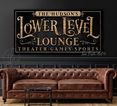 the hudson tavern and lounge sign is displayed in an empty room with leather couches