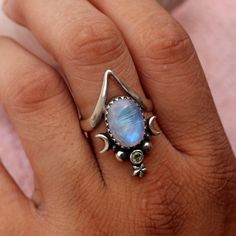 "Natural Moonstone Ring, Boho Ring, 925 Sterling Silver, Crescent Moon Ring, Moonstone Jewelry, Ring For Women, Gift For Her, Wedding Ring SHOP LINK:- https://www.etsy.com/shop/MaaShabashibaJewell?ref=seller-platform-mcnav 》D E T A I L S《 Gemstone: Natural Rainbow Moonstone                     Gem Color: Blue                     Stone Shape: Oval                                       Metal: 925 Sterling Silver Purity: 925 Parts Per 1000 Setting Type: Bezel Set Silver Polish: High Ring Size: All Size Available Please note that there Can be slight variations in stone texture and color shades in the actual product that you receive. The stone quality or grade will be the same. Because We Use Natural Stones And All Natural Stones Are Not Of Same Textured. All Our Jewelry Is 925 Stamped. Our pro Silver Celestial Opal Ring With Birthstone, Crescent Moonstone Promise Ring, Mystical Moon Phase Ring For Anniversary, Silver Oval Moon Phase Ring, Moon Shaped Sterling Silver Opal Ring, Mystical Moon-shaped Moonstone Ring In Sterling Silver, Crescent Moonstone Ring In Sterling Silver, Sterling Silver Crescent Moonstone Ring, Moon-shaped Sterling Silver Opal Ring