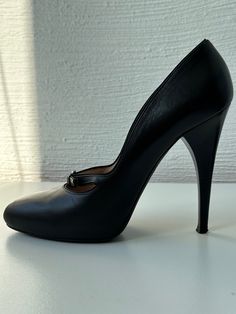 Loewe shoes, black, 100% genuine leather inside, outside and sole. Used once. Excellent condition. Size 38. Made in Italy. Heel height - 12 cm. Elegant Round Toe Heels With Rubber Sole, Elegant Heels With Rubber Sole For Evening, Elegant Evening Heels With Rubber Sole, Chic Evening Heels With Rubber Sole, Evening High Heel Leather Shoes With Leather Sole, Evening Heels With Almond Toe And Rubber Sole, Evening Leather Shoes With Calf Leather And Round Toe, Evening Leather Shoes With Round Toe In Calf Leather, Timeless Calf Leather Heels With Round Toe