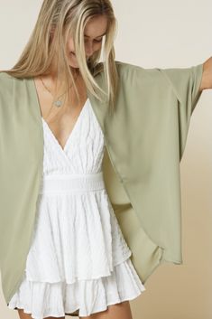 Light weight, silky smooth chiffon kimono. Creasing detail at shoulder. Perfect way to add a touch of color this spring & summer! Made in USA 100% Polyester Flowy V-neck Kimono For Day Out, Chic V-neck Summer Kimono, Elegant V-neck Kimono For Spring, Versatile Open Front Summer Tops, Flowy Open Front Top For Spring, Spring Summer Kimono For Brunch, Summer Kimono With Kimono Sleeves For Brunch, Spring Tops With Kimono Sleeves For A Day Out, Summer Style Spring Kimono For Brunch