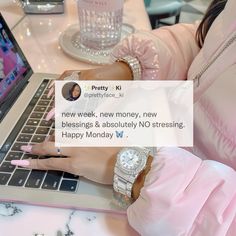 a woman sitting at a table with a laptop computer in front of her and the caption reads happy monday