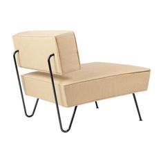 a beige chair sitting on top of a metal frame