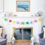 a living room filled with furniture and a fire place in front of a painting on the wall