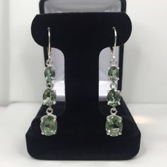 "Beautiful Green Spinel \"Tourmaline\" Leverback Earrings * Oval Cut Green Spinel \"Tourmaline\" measure 10x8mm, 8x6mm and 7x5mm each * 9.8cts total Gemstone weight * Leverback Fastening * Each measure 2 inches Long * Solid Sterling Silver Hallmarked & Gift Ready! Matching Pendant, Ring & Bracelet also Available! These Spinels are laboratory grown stones. They are identical to the genuine stone in every way, including chemistry, composition and hardness, with an outstanding cut, clarity Elegant Round Tourmaline Earrings, Elegant Oval Tourmaline Earrings, Round Tourmaline Gemstone Earrings, Tourmaline Gemstone Earrings In Fine Jewelry Style, Fine Jewelry Tourmaline Gemstone Earrings, Elegant Tourmaline Earrings For Formal Occasions, Tourmaline Gemstone Drop Earrings, Elegant Tourmaline Earrings With Gemstone Accents, Fine Jewelry Tourmaline Earrings For Formal Occasions