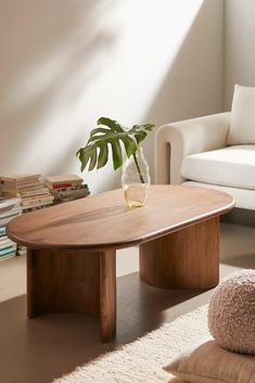 a living room with a couch, chair and coffee table