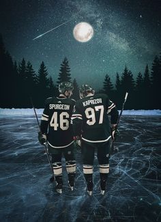 two hockey players standing on an ice rink under the night sky with stars above them