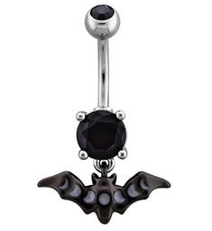 a black and silver belly ring with an evil bat design on it's side