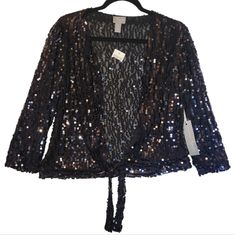 Nwt (New With Tags! Never Worn! Perfect Condition!) Chico's Travelers Collection "Ginger" Jacket - Lightweight Navy Semi-Sheer Navy Sequin Jacket / Cardigan / Top Open Front, Tie At Waist Perfect For Wearing Over A Formal Dress, Mother Of The Bride Chico's Size 1 = M Medium 3/4 Length Sleeve From A Pet And Smoke Free Home Approx Measurements: Bust, Pit To Pit, Flat Across = 19.5" (Measured Across Back, Since Front Is Open) Length, Shoulder To Waist = 21.5" Sleeve Length = 19" Fitted Cardigan For Fall Party, Fitted Holiday Cardigan For Party, Fitted Long Sleeve Holiday Cardigan, Fitted Holiday Cardigan, Spring Evening Fitted Cardigan, Sequin Cardigan For Spring Night Out, Sequin Cardigan For Night Out In Spring, Glamorous Spring Cardigan For Night Out, Fitted Evening Cardigan For Spring