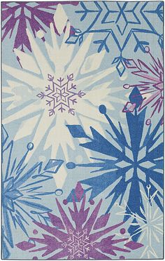 a blue and purple rug with snowflakes on it