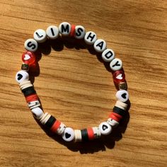 Eminem Bracelet Ideas, Braclets Ideas Clay Beads, Music Bracelet Ideas, Drake Bracelet, Eminem Bracelets, Eminem Bracelet, Clay Bead Friendship Bracelets, Band Bracelet Ideas, Clay Bead Bracelets Ideas