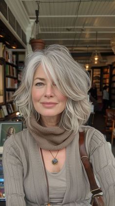 "Elegant Transformations: Gorgeous Hairstyles and Haircuts for Women Over 50. Rediscover Your Radiance! Timeless Looks for Timeless Beauty. Blending Gray Hair, Long Gray Hair