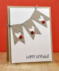 a happy birthday card with two bunting flags