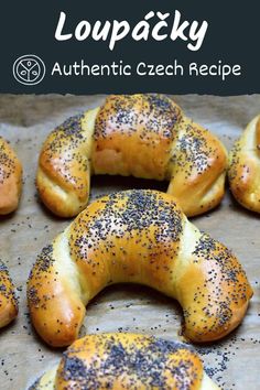 bagels with poppy seed sprinkles are on a baking sheet and the words, loupaky authentic czech recipe