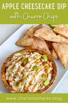 apple cheesecake dip with churro chips in a wooden bowl on a white plate