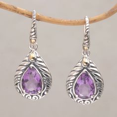 Sophisticated and elegant these sensational dangle earrings come from Balinese artisan Lenny who loves working with beautiful gemstones. Beneath a swirling vine motif engraved on a sterling silver hook a faceted pear-shaped amethyst shimmers brilliantly from a prong setting. Drop-shaped sterling silver encloses the gemstone with an intricate floral design. Two dainty pear-shaped accents of 18k gold complete the dangle earrings with an alluring opulent appeal. Silver Owl, Gold Accent, Buy Gold, Balinese, Jewelry Packaging, 925 Sterling Silver Earrings, Hook Earrings, Jewelry Gift Box, Ancient Greek