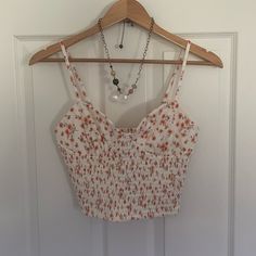 Forever 21 White, Peach & Pink Floral Sweetheart Bustier Crop Camisole Blouse With Adjustable Straps. Size Medium. Nwt. Stretch. Cotton, Polyester & Elastane. Please Send Reasonable Offers Through The Offer Button! Follow To Keep Updated! (Y14) Feminine Spring Crop Top With Built-in Bra, Fitted Spaghetti Strap Summer Crop Top, Fitted Spaghetti Strap Crop Top For Summer, Feminine Fitted Crop Top For Summer, Fitted Floral Print Tank Top For Day Out, Trendy Bra-friendly Camisole For Spring, Feminine Summer Crop Top Bra Friendly, Cute Fitted Crop Top With Spaghetti Straps, Feminine Spring Crop Top With Bra-friendly Design