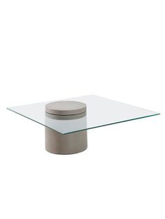 a square glass table with a metal base and an aluminum lid on the top, in front of a white background