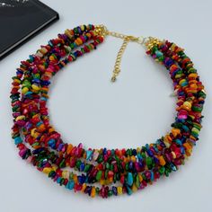 "This beautiful Colorful Natural Shell Chips Necklace is completely handmade with high quality. It can be worn with everything and everywhere, at a holiday party or after work with friends! This is a handcrafted necklace, uniquely designed with attention to every detail. - Necklace length is 17\" long plus additional 4 inches extender chain for adjustment. Made from natural chips dyed shell beads. - non tarnish gold plated finding - clasp is gold stainless steel lobster claw - 4 inches extender Chips Necklace, Friends Necklace, Shell Beads Necklace, Autumn Necklace, Necklace Colorful, Bold Necklace, Christmas Necklace, Rainbow Necklace, Multi Layer Necklace