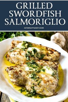 grilled swordfish with lemon and parsley sauce in a white bowl on a wooden table