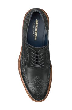 Brogue perforations and wingtip styling add timeless sophistication to a leather derby grounded by a cushioned footbed and shock-absorbing sole. Lace-up style Cushioned footbed with arch support XL EXTRALIGHT® sole is lightweight, flexible and shock absorbent Leather upper and lining/rubber sole Made in Italy Business Lace-up Wingtip Shoes With Cushioned Footbed, Wingtip Derby Shoes For Work With Branded Insole, Business Casual Wingtip Derby With Branded Insole, Black Wingtip Derby Shoes, Black Wingtip Dress Shoes With Perforated Toe Box, Classic Wingtip Derby With Leather Footbed, Wingtip Derby Shoes With Leather Footbed For Work, Black Wingtip Derby Shoes With Goodyear Welt, Black Goodyear Welted Wingtip Derby Shoes