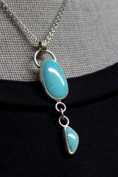 "READY TO SHIP. Two high quality Kingman turquoise teardrops(Arizona mine) set in custom .999 fine silver/.925 sterling silver, suspended from a sterling chain and medium spring clasp. This necklace has a brushed/matte finish. *Each jewelry is made by hand- formed, forged, set and polished. Details * Necklace Length: 15\",16\",18\".20\" * Pendant(Total drop including bail): 2.5\" * Kingman Turquoise: 24mm x 13mm & 14 x 5.8mm * .999 Fine Silver; .925 Sterling Silver * Handmade It comes beauti Sterling Silver Untreated Teardrop Pendant, Turquoise Teardrop Pendant Jewelry, Turquoise Drop Bohemian Jewelry, Bohemian Turquoise Drop Jewelry, Turquoise Bohemian Drop Jewelry, Sterling Silver Turquoise Teardrop Necklace, Handmade Turquoise Drop Jewelry, Turquoise Teardrop Sterling Silver Jewelry, Untreated Sterling Silver Teardrop Jewelry