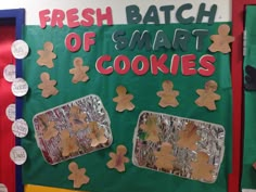 a bulletin board with cut out gingerbreads and words that read fresh batch of smart cookies