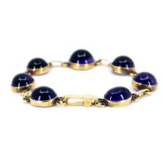 This mesmerizing link bracelet feature cabochon-cut ±30.00ct Amethyst crafted in 18ct. Design Era: Mid-Victorian (1856-1880)., sizeable (within reason). Dimensions: L 19 cm x W 1.5 cm.. Weight in grams: 19.6. Condition: Very good condition - slightly used with small signs of wear. Resizing possible (contact seller for information). Registered Shipping or Local Pickup at our store (in case of Local Pickup; shipping cost if applicable will be refunded). Looking for more antiques & vintage jewe Formal Amethyst Oval Cabochon Jewelry, Formal Amethyst Jewelry, Oval Cabochon, Formal Purple Oval Cabochon Jewelry, Formal Chain Bracelet, Classic Amethyst Cabochon Jewelry, Formal Amethyst Jewelry With Polished Finish, Gold Cabochon Bracelets For Formal Occasions, Luxury Amethyst Bracelets For Formal Occasions, Classic Purple Cabochon Jewelry