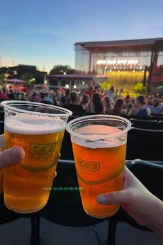 Two hands hold large beers. The two beers cheer in front of an outside concert stage. Beer Cheers Aesthetic, Aesthetic Date Night, Summer Beach House, Beer Cheers, Date Night Ideas, Summer Concert, Night Ideas, Beer Lovers, Country Boys