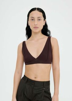 A soft v-neck bralette featuring two layers of cashmere and silk blend japanese jersey for additional support. designed to be worn as a comforting base layer.    ~ also available in black  ~ vertical panelling with exposed seams  ~ elasticated under bust  ~ lightweight and stretchy ribbed jersey  ~ 88% tencel / 4% cashmere / 4% silk / 4% pu  ~ louise is 176cm and wears xs    made in melbourne australia Vertical Panelling, Japanese Jersey, Birkenstock Eva Arizona, Cream Converse, Tube Maxi Dresses, Permanent Vacation, Vacation Tops, Structured Bag, Exposed Seams