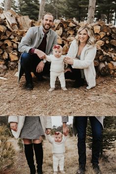 a man and woman holding a baby in their arms while sitting next to a pile of wood