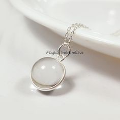 "Natural Clear Quartz Necklace, 925 Sterling Silver Jewelry, Quartz Ball Design Necklace, Minimalist Necklace, Bridesmaid Gift, Wedding Gift  : D E T A I L S : Handcrafted with lots of love ♥ and care Gemstone- Clear Quartz  Finish: Silver  Closure: Lobster clasp Measurement: Length: 17\" Extender: 2\" Pendant Size: Width: 13.2 mm, Length: 20 mm Our Jewelry is Gold polished on 925 sterling silver metal. This piece of jewelry is perfect as a gift for yourself, for a friend, a gift for Valentine's day, or a birthday. Magical Treasure Cave: Please check out the rest of our shop by clicking: https://www.etsy.com/in-en/shop/MagicalTreasureCave QUESTIONS: We are always happy to answer any of your questions, so please contact us via convo, we would love to hear from you! : C A R E : Please do not Silver Birthstone Charm Necklaces For Weddings, Silver Charm Necklaces With Birthstone For Wedding, Silver Birthstone Charm Necklace For Weddings, Silver Charm Necklace With Birthstone For Wedding, Delicate Silver Hypoallergenic Charm Necklace, Adjustable White Sterling Silver Charm Necklace, Delicate Hypoallergenic Silver Charm Necklaces, Adjustable White Sterling Silver Charm Necklaces, Delicate Hypoallergenic Silver Charm Necklace