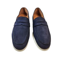 Elevate Your Style With These Ecco Men's Penny Loafers. Crafted With Laser-Cut Diamond Patterns On Blue Nubuck Leather, These Slip-On Shoes Feature A Round Toe And The Brand's Logo As An Accent. Perfect For Travel, Casual Wear, And Work, These Loafers Offer A Standard Shoe Width And A Comfortable Fit Thanks To The Leather Insole And Synthetic Outsole Materials. Ideal For Any Season, These Shoes Are Available In Uk Size 10 And Us Size 9-9.5. Made In Portugal With High-Quality Leather Lining And U Blue Casual Slip-on Loafers, Blue Slip-on Loafers, Blue Leather Slip-on Loafers, Blue Slip-on Synthetic Loafers, Luxury Blue Slip-on Loafers, Slipon Shoes, Ecco Shoes, Nubuck Leather, Penny Loafers