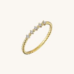 The Mini Ball Ring’s design has become a masterpiece of elegancy with its unique style. Its glittering stones become completely more beautiful when they meet the splendor of gold. The Mini Ball Ring, generously demonstrate its eye-catching glow by its sparkling stones, will look much more beautiful in your slender hands. - Made in 14k solid gold, - Decorated with handset london blue cubic zirconia stone on 14k solid gold - Band Width: 1.52 mm / 0.059 inches - Thickness: 1.50 mm / 0.05 inches -Th Classic Gold Sparkling Rings, Fine Jewelry Gold Sparkling Rings, Gold Sparkling Rings Fine Jewelry, Gold Sparkling Fine Jewelry Rings, Fine Yellow Gold Sparkling Rings, Elegant Yellow Gold Sparkling Diamond Ring, Gold Sparkling Rings For Anniversary, Sparkling Gold Rings For Anniversary, Gold Sparkling Anniversary Rings