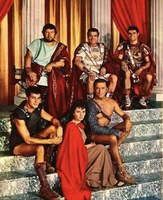 the cast of sparta in costume posing for a photo