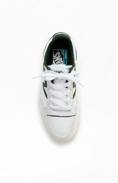 Show off a sleek new aesthetic at the court or the skate park with the Court Lowland Jump Shoes from Vans. These shoes feature a low-top profile, a lace-up closure, a retro tongue label, and supportive padded collars for a comfortable fit..90s retro-inspired silhouette.Slim, low-top profile.Lace-up closure.ComfyCush™ outsole.Heritage “Flying V” logo.Retro tongue label.Colored piping.Supportive padded collars.Durable suede and textile uppers Logo Retro, New Aesthetic, V Logo, Flying V, Retro Logos, 90s Retro, Vans Shop, Skate Park, Vans Sneakers