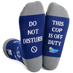 two pairs of blue and grey socks that say, do not disturb is off duty