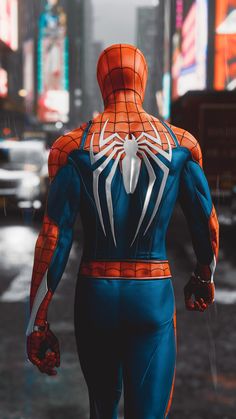 the amazing spider - man is walking through the city