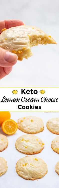 a person holding an orange cream cheese cookie