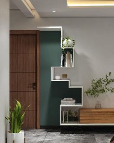 a modern living room with green walls and white shelving unit on the wall next to a potted plant