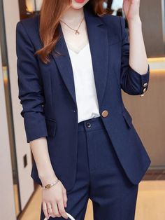 Product Details Our Women's Elegant Business Pant Suit is the perfect addition to any wardrobe. Crafted from a polyester blend, this set features a slim fit, slight stretch, and pockets for added convenience. The blazer features a notched collar and double breasted closure, while the pants feature a zipper fly and ankle-length fit. Available in khaki, navy blue, and coffee, this set is perfect for any occasion. This set is perfect for the modern woman. With its slim fit and stylish design, it is Dressy Pant Suits, Ladies Trouser Suits, Blazer Suit Women, Costume Africain, Casual Suit Jacket, Pant Suits For Women, Korean Clothes, Women Blazer, Business Pants