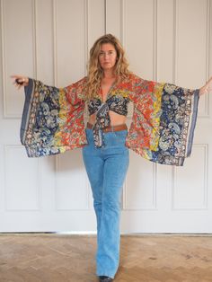 SILK BELL SLEEVE CROP TOP - RAINBOW FIRE SKY ** LIMITED PRINT AVAILABLE **  Handmade recycled silk crop kimono with amazing billowing bell sleeves and gold printed fabric! The gold shimmers and shines, the photos don't do it justice!  This incredible silk crop top is the perfect addition to any outfit, with flowing sleeves and bohemian vibe, this is an amazing bespoke piece to add to any wardrobe!  Our 'Bella' tops were dreamed up in the sunshine and are a twist on our classic 'Stevie' tops and Hippie Rayon Tops For Festival, Hippie Style Rayon Festival Tops, Bohemian Beach Crop Top For Fall, Vintage Boho Print Tops For Beach, Hippie Rayon Festival Tops, Bohemian Crop Top For Beach In Fall, Bohemian Crop Top For Beach And Fall Season, Bohemian Crop Top For Fall Festivals, Multicolor Rayon Tops For Festival