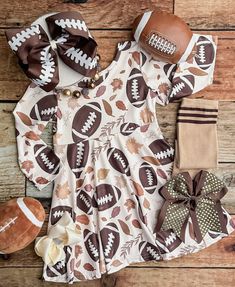 Your little one will look simply adorable in this football and leaves twirl dress! Perfect for game day, it captures team spirit with its playful football print and twirl skirt. An absolute must-have for any little girl, it'll have her cheering in style! Diy Tutu Skirt, Game Day Dress, Football Dress, Girls Football, Diy Tutu, Holiday Clothes, Gameday Dress, Twirl Skirt, Leaves Fall