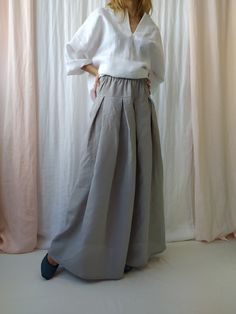 "Maxi linen skirt with pockets is perfect choice when you need casual, comfortable and stylish outfit combination. High waist linen skirt is clothing piece that can be easily paired with any top and creates a charming feminine look. Before placing an order, check the approximate measurements given below. If you are unsure about your size or would like to adjust the length of the item, you could leave your personal measurements (height, waist and hips) in a personalization box. SIZE and FIT Size Spring Long Gathered Skirt, Chic Relaxed Fit Full Skirt Bottoms, Spring Flared Skirt With Pockets, Long Skirt With Pockets For Spring, Spring Flared Skirt Bottoms With Pockets, Spring Skirt Bottoms With Pockets, Chic Relaxed Fit Skirt With Pockets, Elegant Long Skirt With Relaxed Fit, Voluminous Long Lined Skirt