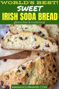 a loaf of irish soda bread sitting on top of a wooden cutting board